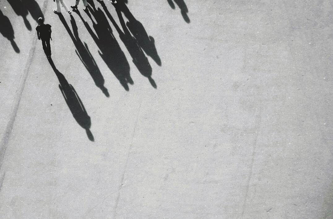 shadowy figures in meeting