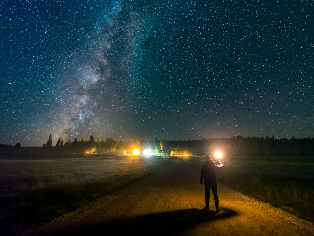 investigators examining night sky